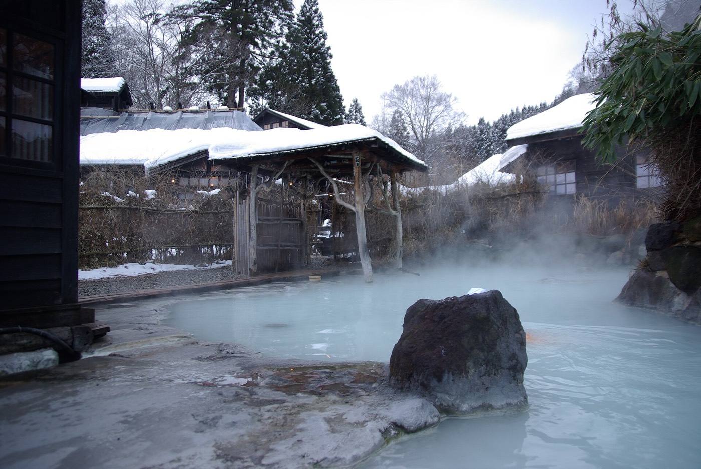 the open-air bath at Nyuto Onsen in snow