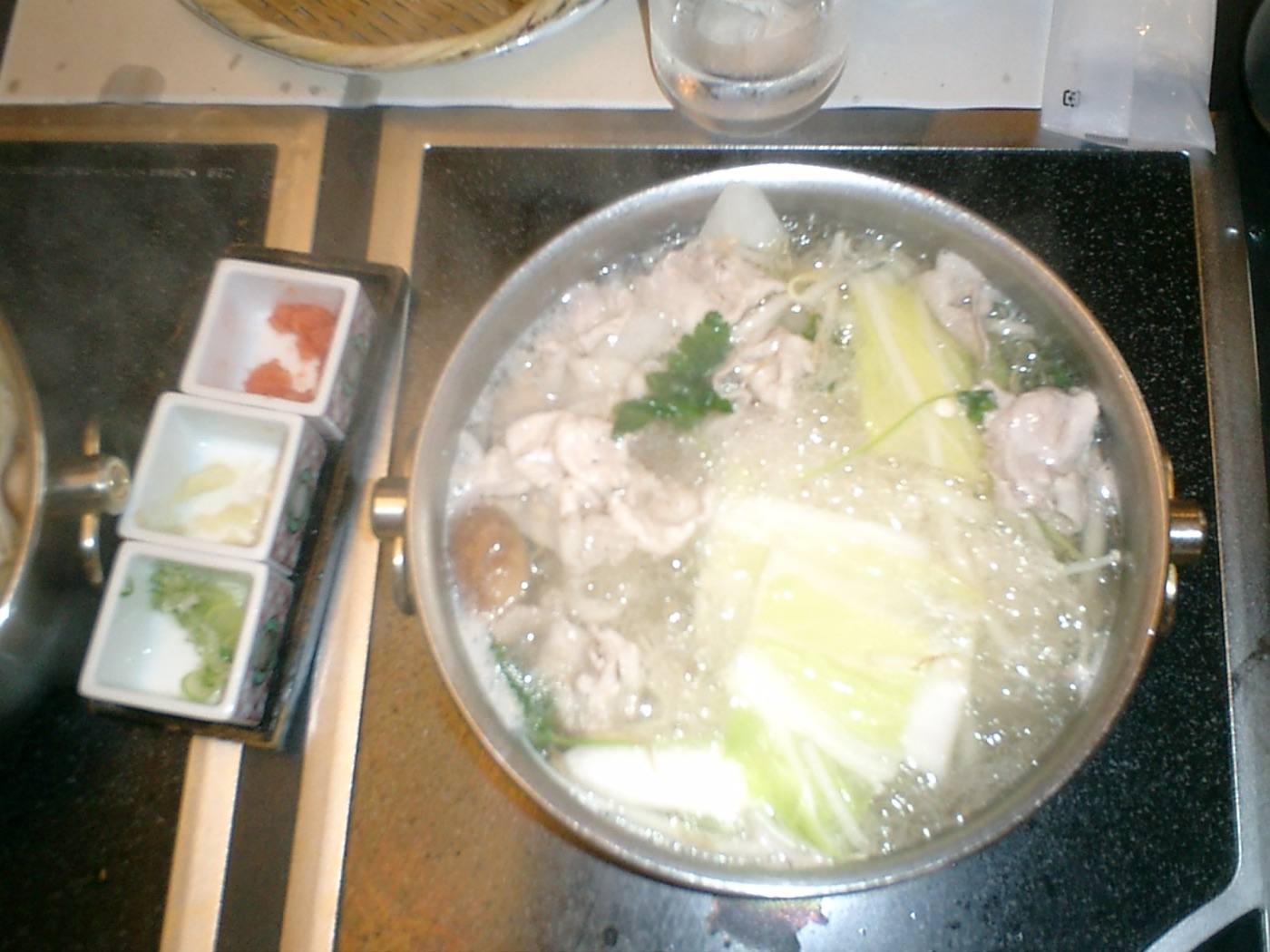 mizutaki chicken broth in the pot