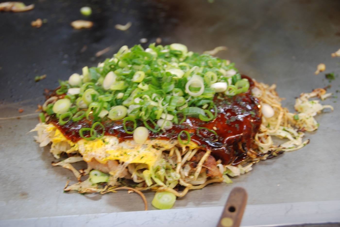 Hiroshima-style okonomiyaki layered with noodles