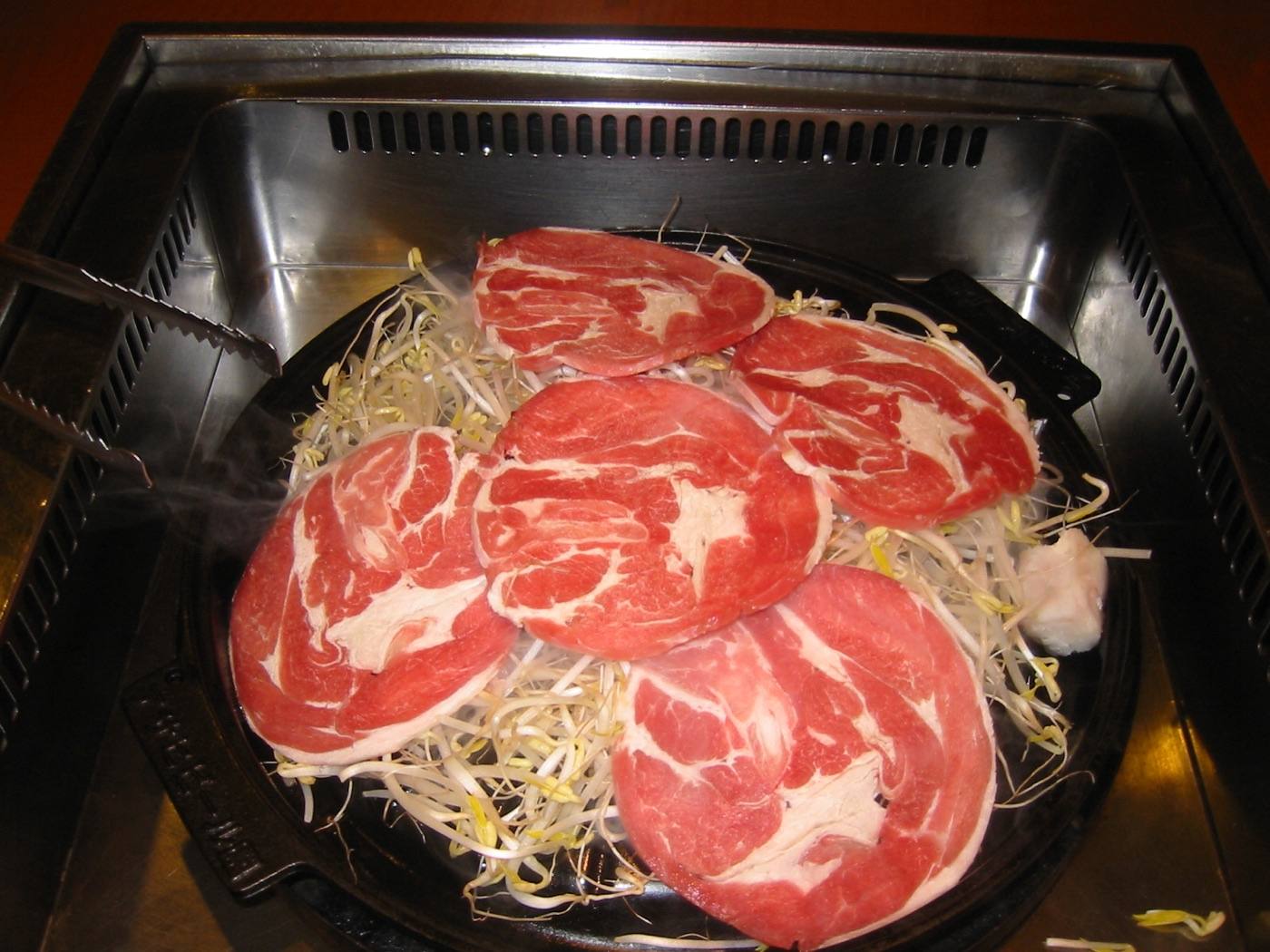 jingisukan lamb on a domed iron pan