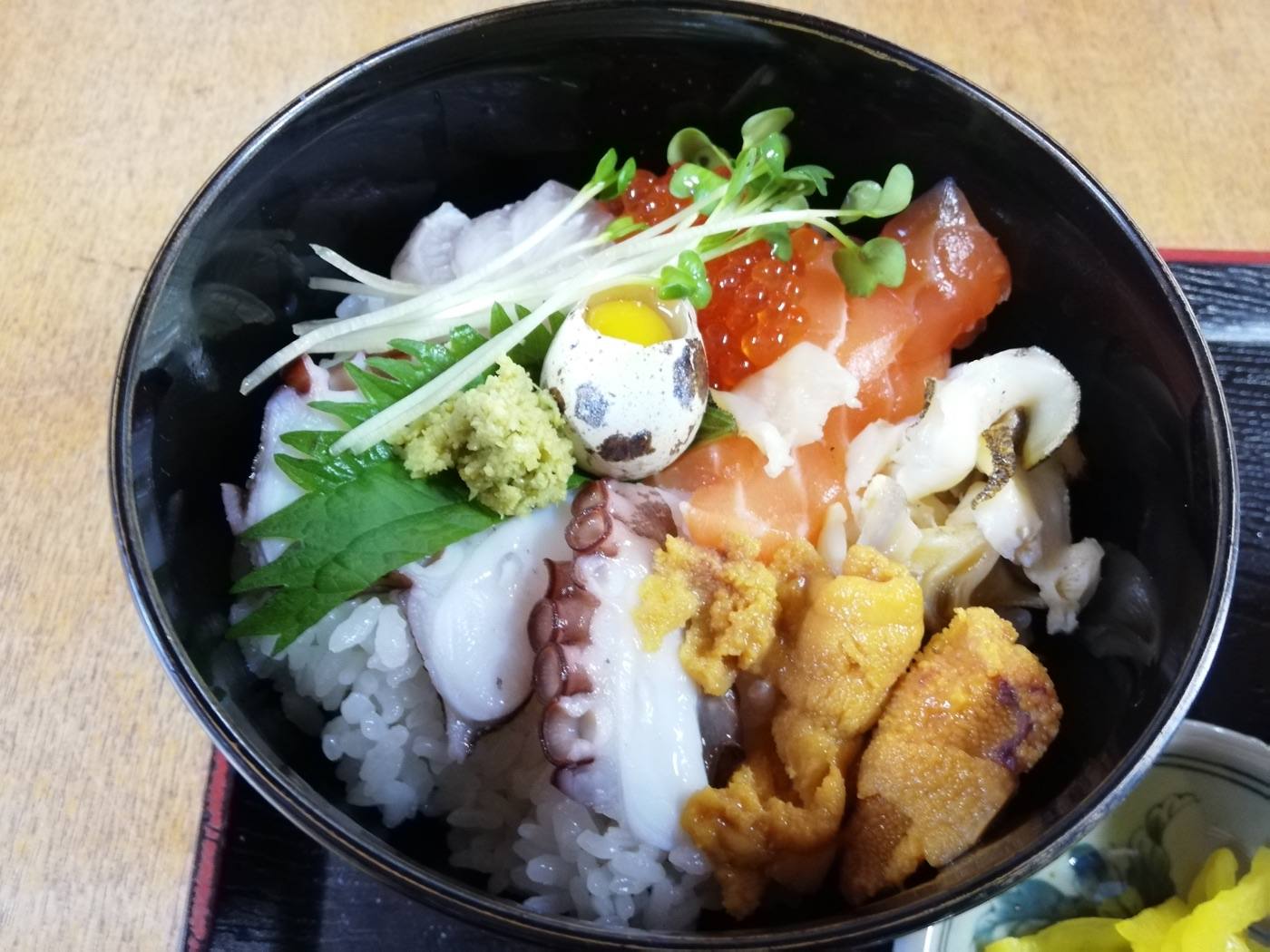 a seafood bowl at Omicho Market