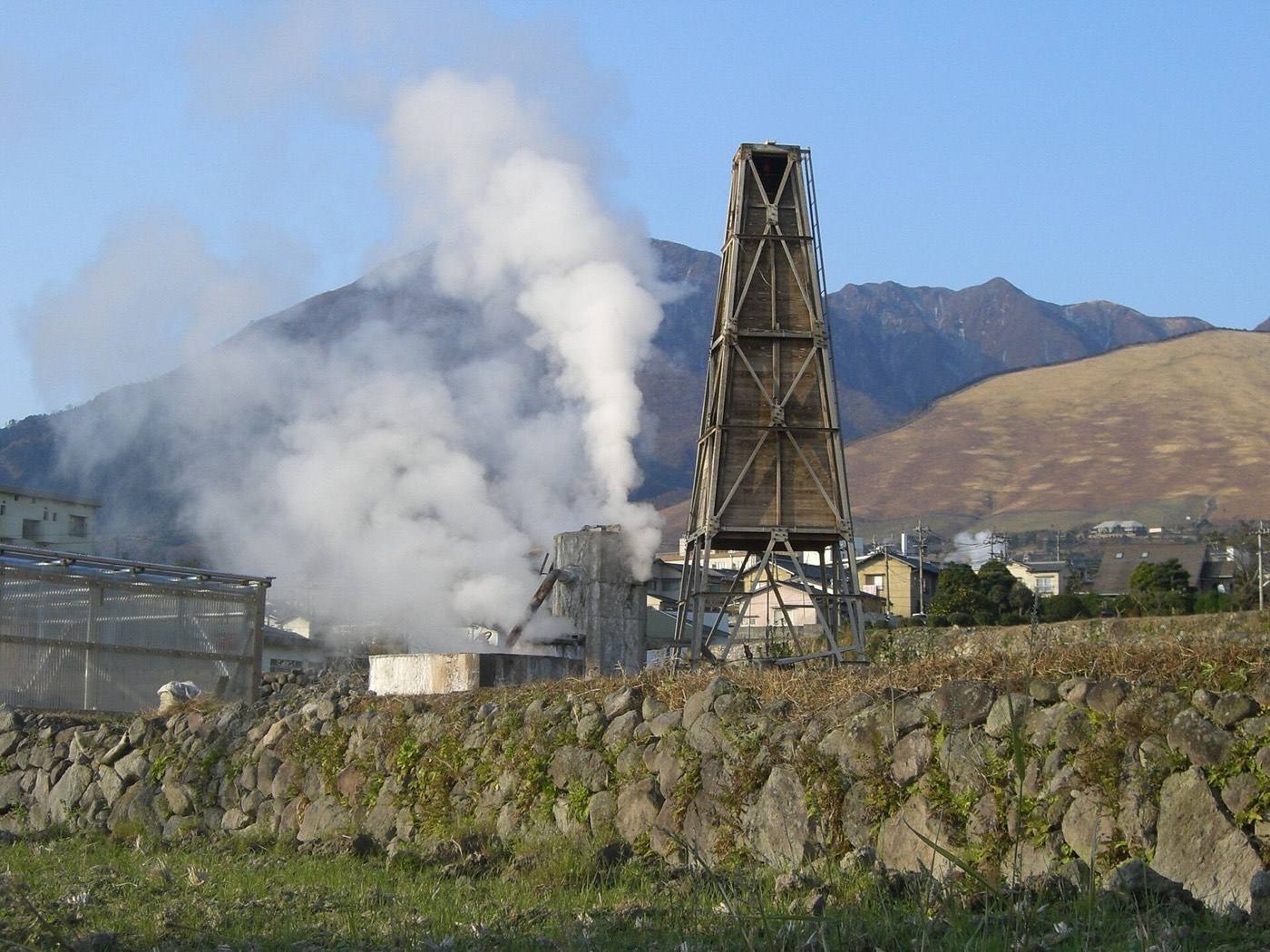 steam rising over the rooftops of Beppu