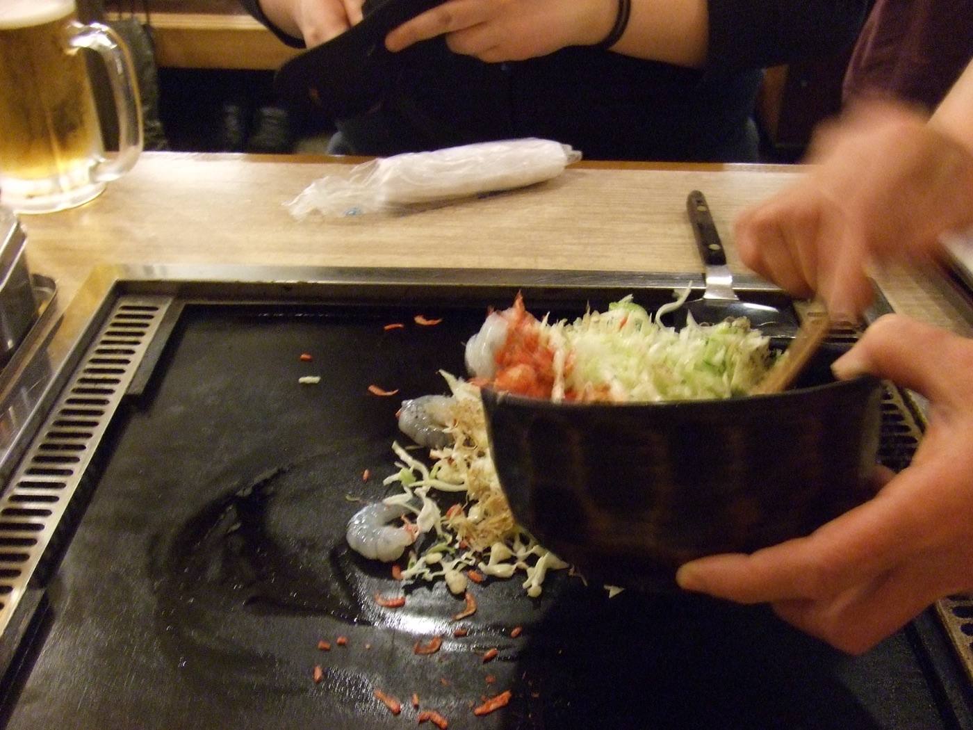 monjayaki cooking on the griddle